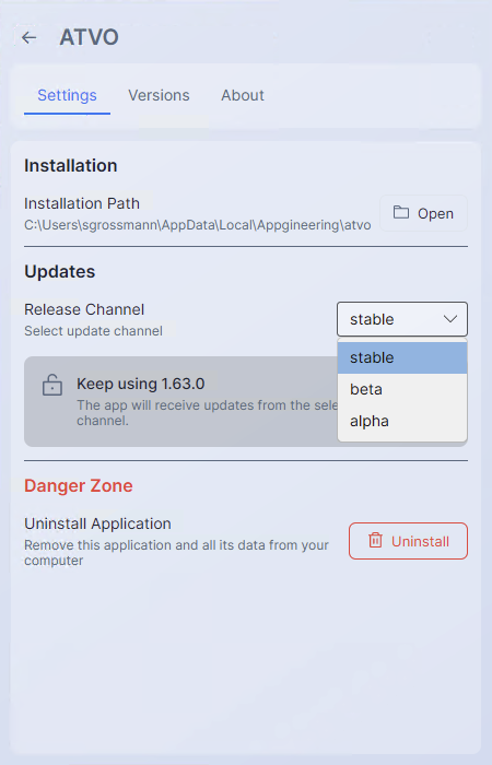 Screenshot: The channel dropdown open on an application's Settings tab, showing the three channel options with color-coded badges.