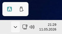 Screenshot: The macOS menu bar with the Launcher's "A" icon visible alongside other menu bar items, plus a comparison shot of the Windows system tray with the colored Launcher icon.